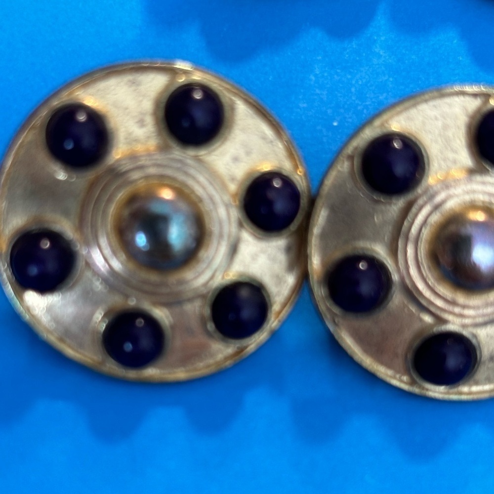 Vintage round muted gold earrings with blue stones